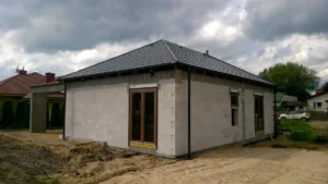 Prízemný dom z dachem kopertowym 110 m2 Poznań 16