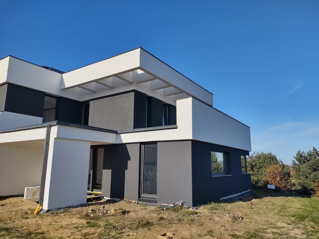 Domy energooszczędne Trójmiasto - dom piętrowy z dachem płaskim i garażem