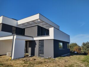 Domy energooszczędne Trójmiasto - dom piętrowy z dachem płaskim i garażem