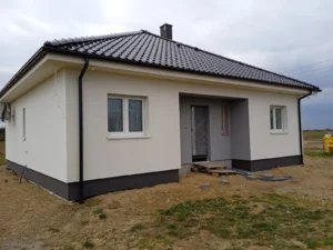 Firma budowlana Poznań - Prízemný dom z dachem kopertowym